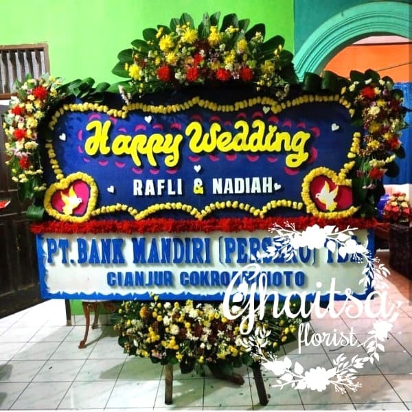 Jambul-3-Bunga-Papan-Ucapan-Wedding-650.jpg